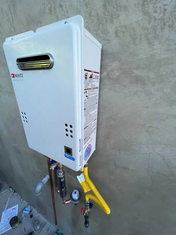 Tankless water heater installation for Biedman homes